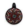 Black Opal Mandala Glass Pendant with red, white, amber, teal, and iridescent mandala-style colourwork.
