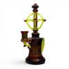 Huffy x Griffin Banger Hanger dab rig with amber worked glass, neon yellow accents, and red details.