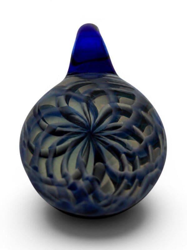 Blue Ornamental Smudge Cap Pendant with cobalt blue loop, smoky glass body, and raised mandala-style design.