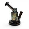 JAG x Pyrology Collab Riglet Right Side View | handcrafted borosilicate glass dab rig with gold industrial graphics