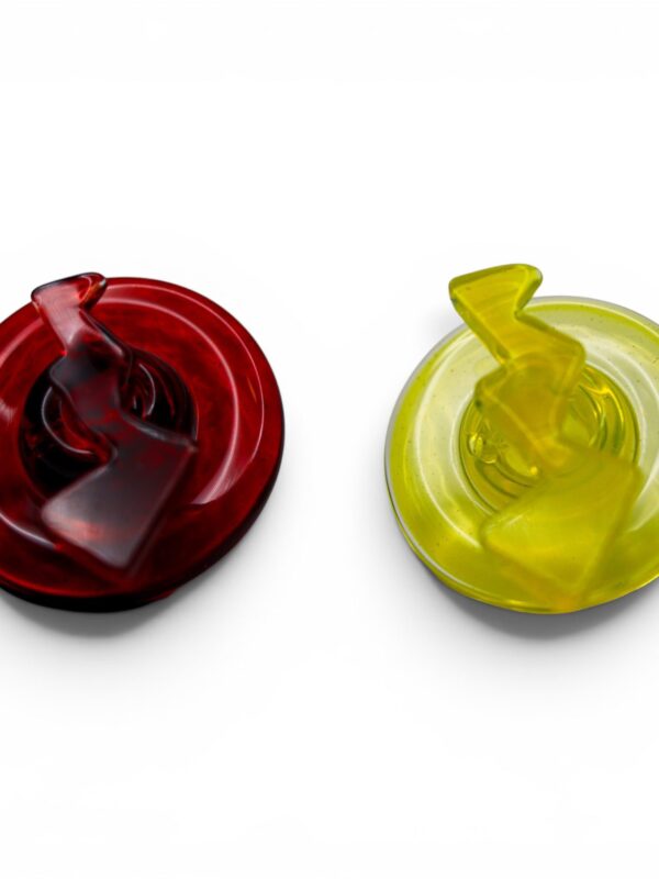 Ruby red directional glass carb cap shown with raised handle and airflow design.
