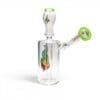 Side view of Medicali Spin Doctor Dab Rig with angled mouthpiece, clear glass body, green rim accent, and concentrate attachment.
